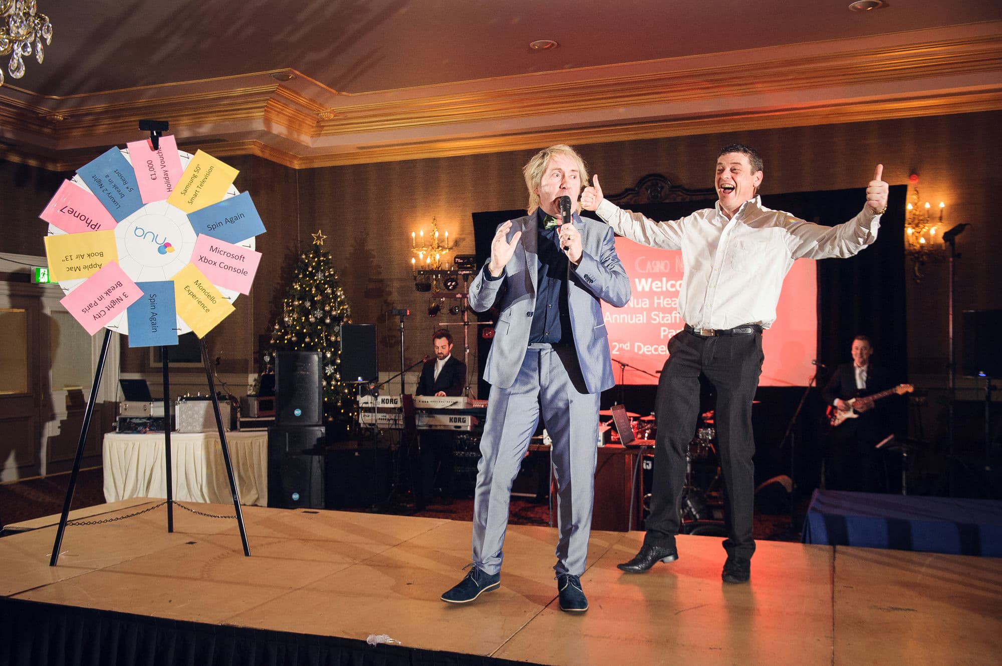 Awards are being announced by the emcee at a gala dinner and awards ceremony in Dublin