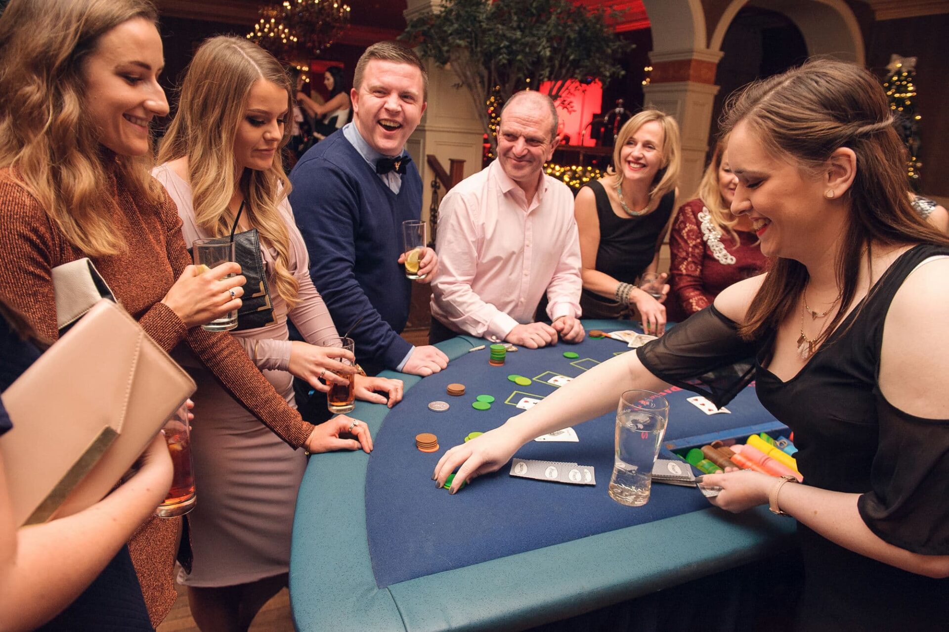 gambling at the blackjack tables at a fun casino night themed event