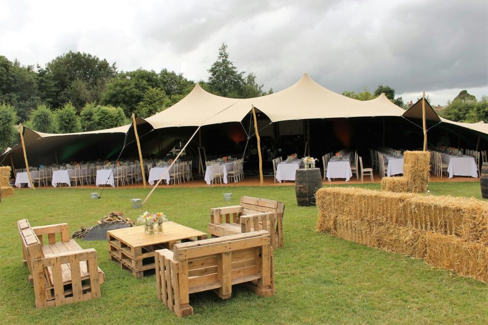 A large stretch tent marquee to accommodate more an one hundred guests is setup for a large company event in Dublin