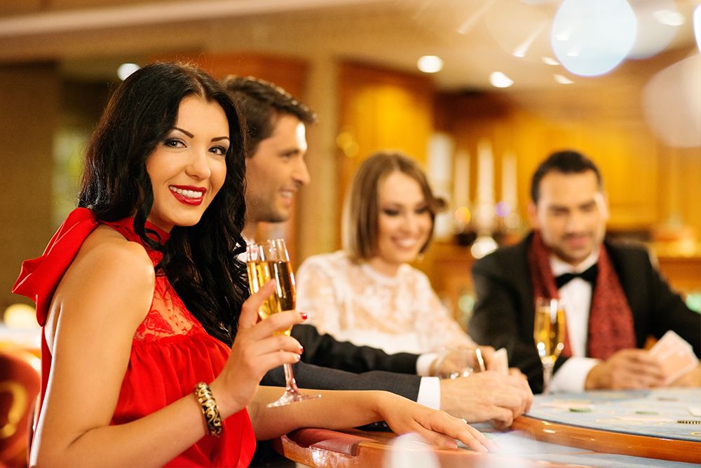 Adults seated at a dinner table at a fancy company event