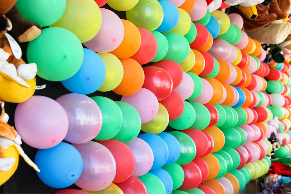 Balloons mounted and ready to be popped at a carnival